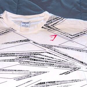 white with black and neon pink logo gymshark oversized t shirt